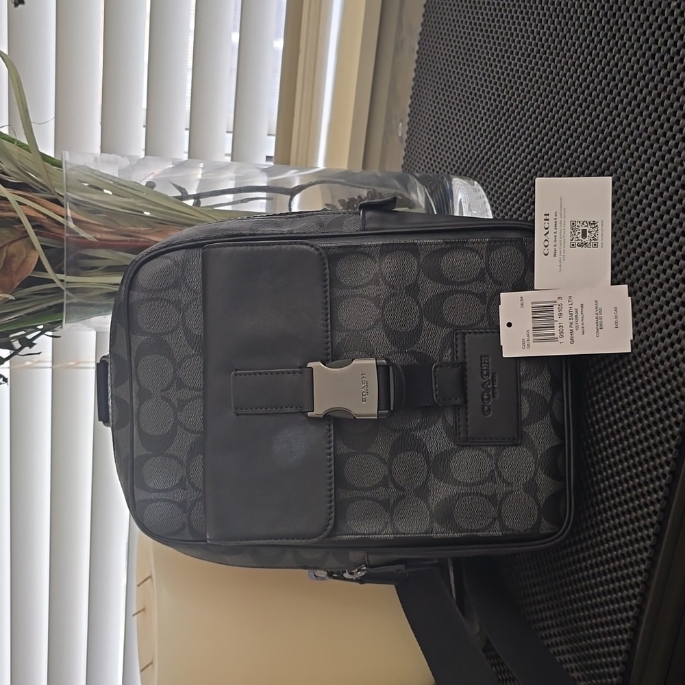 Coach Track Pack In Signature Canvas - image 1